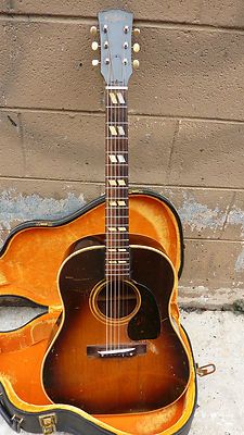 vintage acoustic gibson guitar